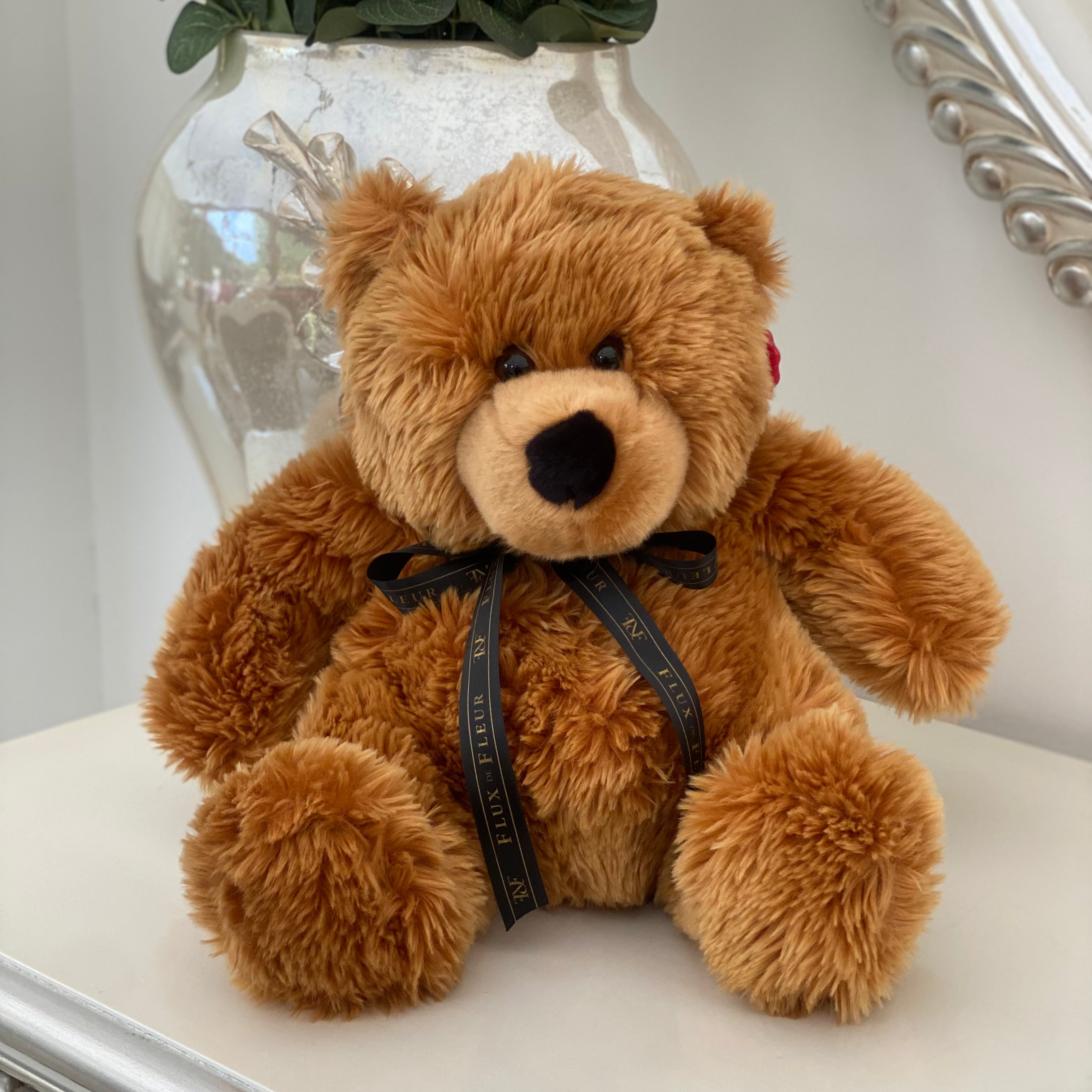 Tan teddy bear on sale